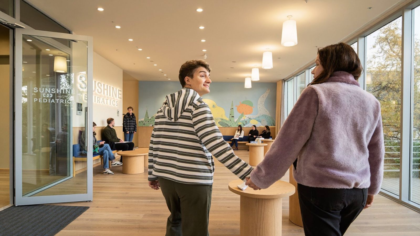 Couple arriving at a clinic waiting room